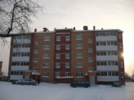 Семьи аграриев в Первомайском районе Томской области получили жилье в новом многоквартирном доме