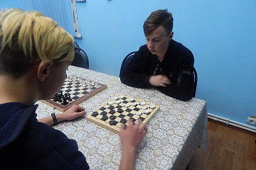 Турнир по шашкам и шахматам